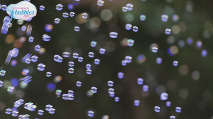 PoppinColorz Galactic Bubble Machine creating stain-free color bubbles with lights, music, and spinning UFO design for outdoor kids play